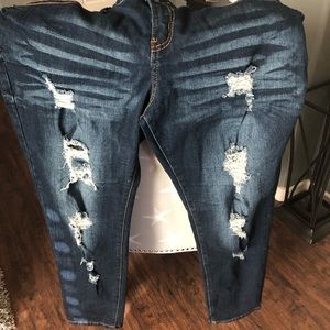 Distressed dark wash jeans